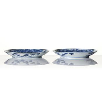A pair of blue and white 'crane' dishes, Qing dynasty with Guangxu mark and of the period (1875-1908).