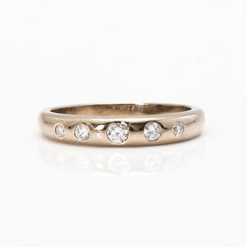 A 14K white gold ring with diamonds ca. 0.15 ct in total. Estetika Oy, Helsinki 2000.