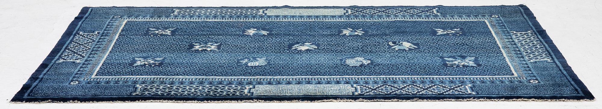 An antique Baotou carpet, north China, c. 257 x 155 cm.