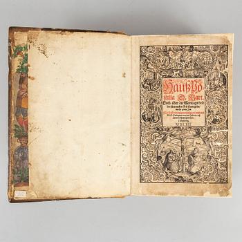 Martin Luther’s Haußpostil, 1553, with numerous coloured woodcuts.