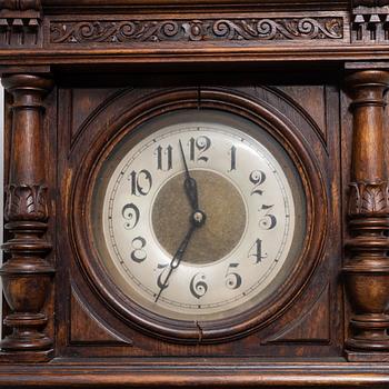 A long-case clock, late 19th century.