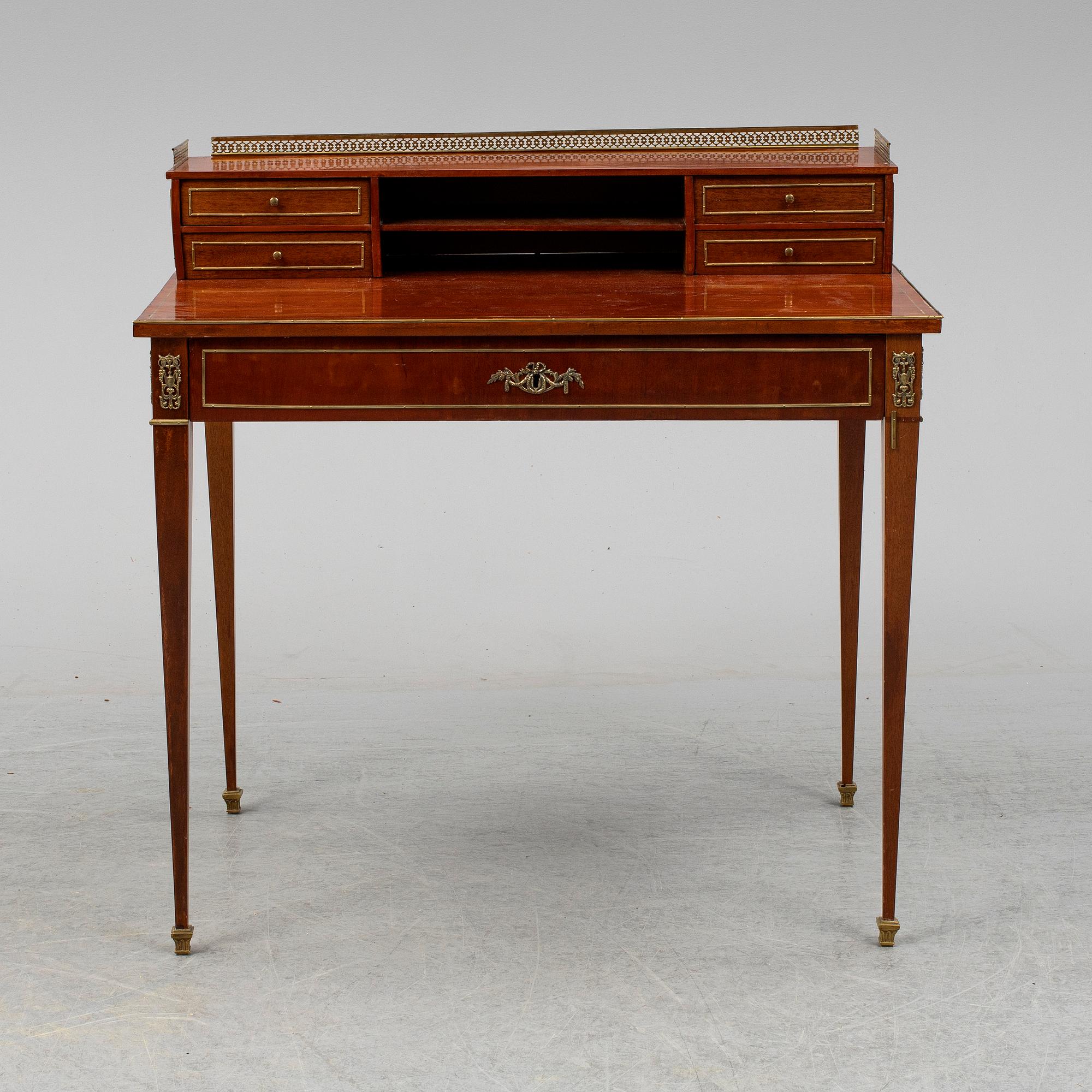 A Louis XVI-style writing desk, 20th ct.