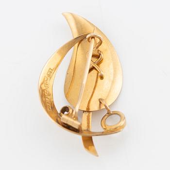 Brooch, leaf-shaped, 18K gold with moonstone and sapphire.