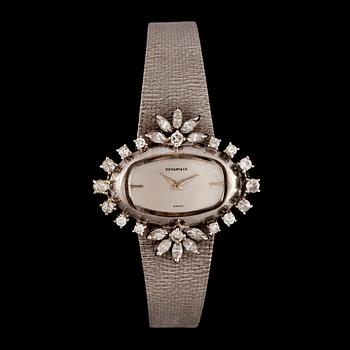 85. A Tiffany & co ladies wristwatch. Circa 1960- 70. Bezel set with brilliant- and navette-cut diamonds.