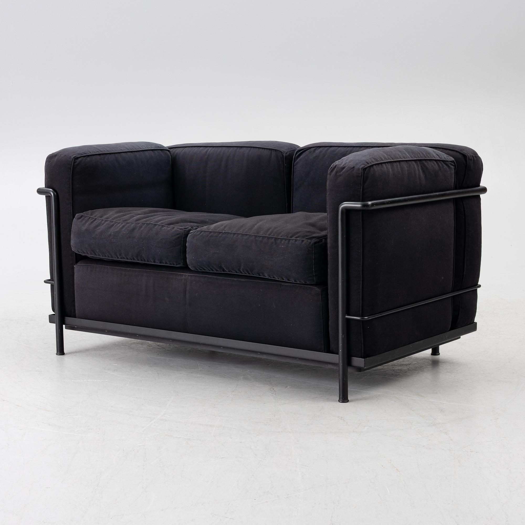 Pierre Jeanneret, Charlotte Perriand & Le Corbusier, an 'LC 2' sofa, Cassina, Italy.