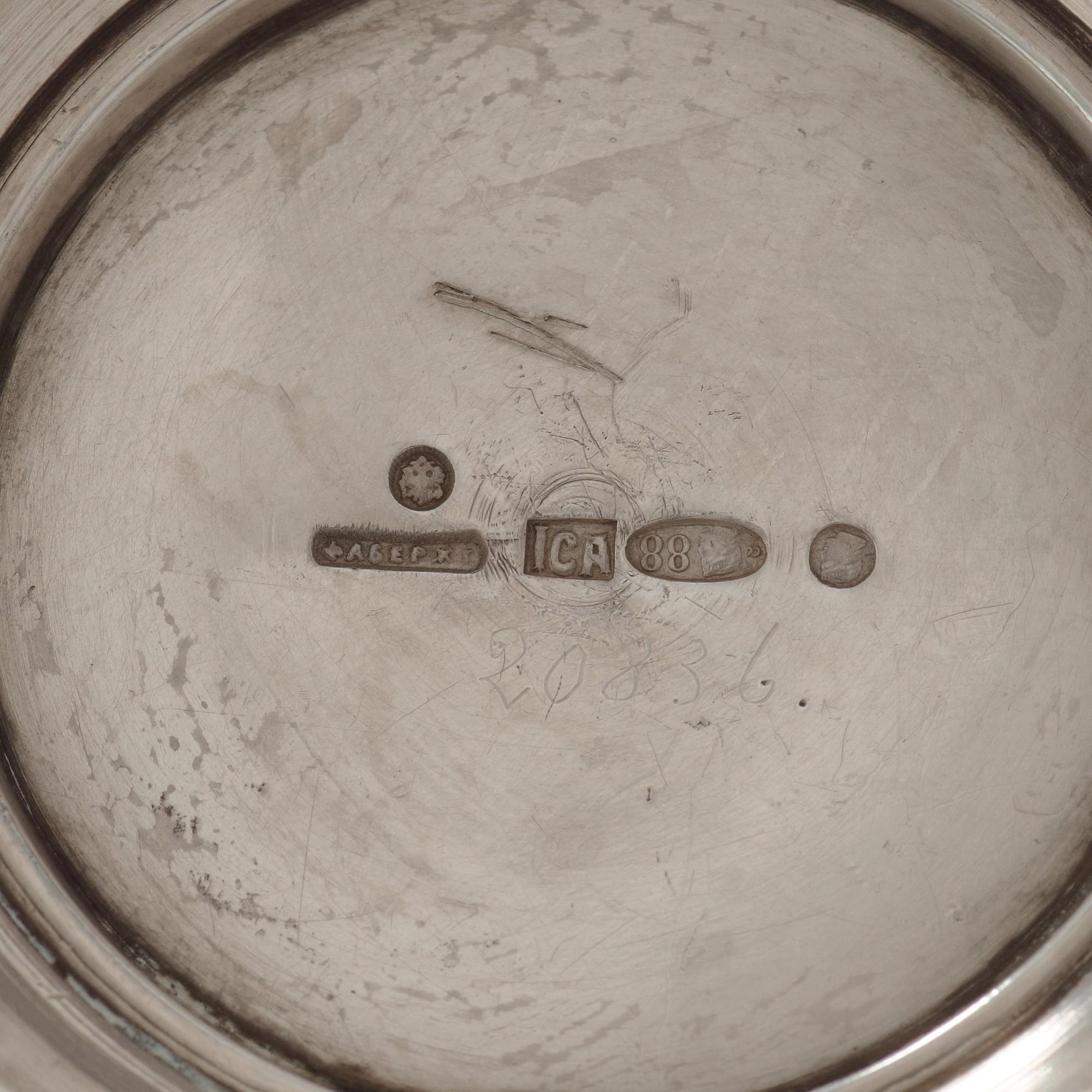A Russian early 20th century FABERGÉ silver burner, marks of The First Silver Artel, S:t Petersburg 1908-1917.