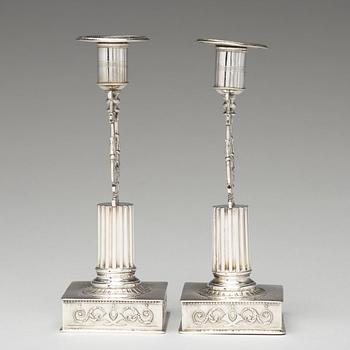 A pair of Swedish 19th century silver cadlesticks, mark of Johan Petter Grönvall, Stockholm 1823.