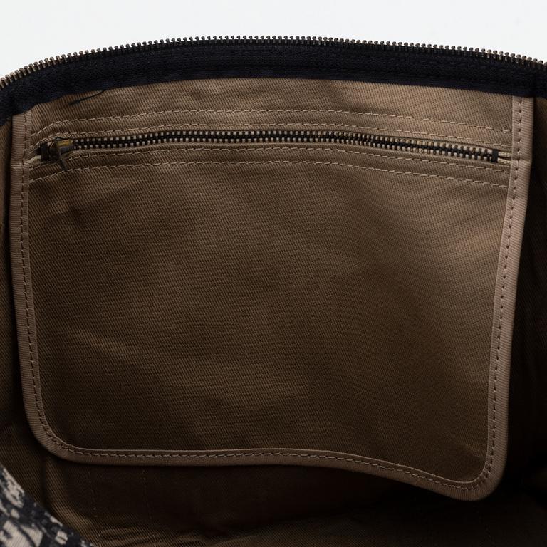 Christian Dior, weekendväska med paraply.