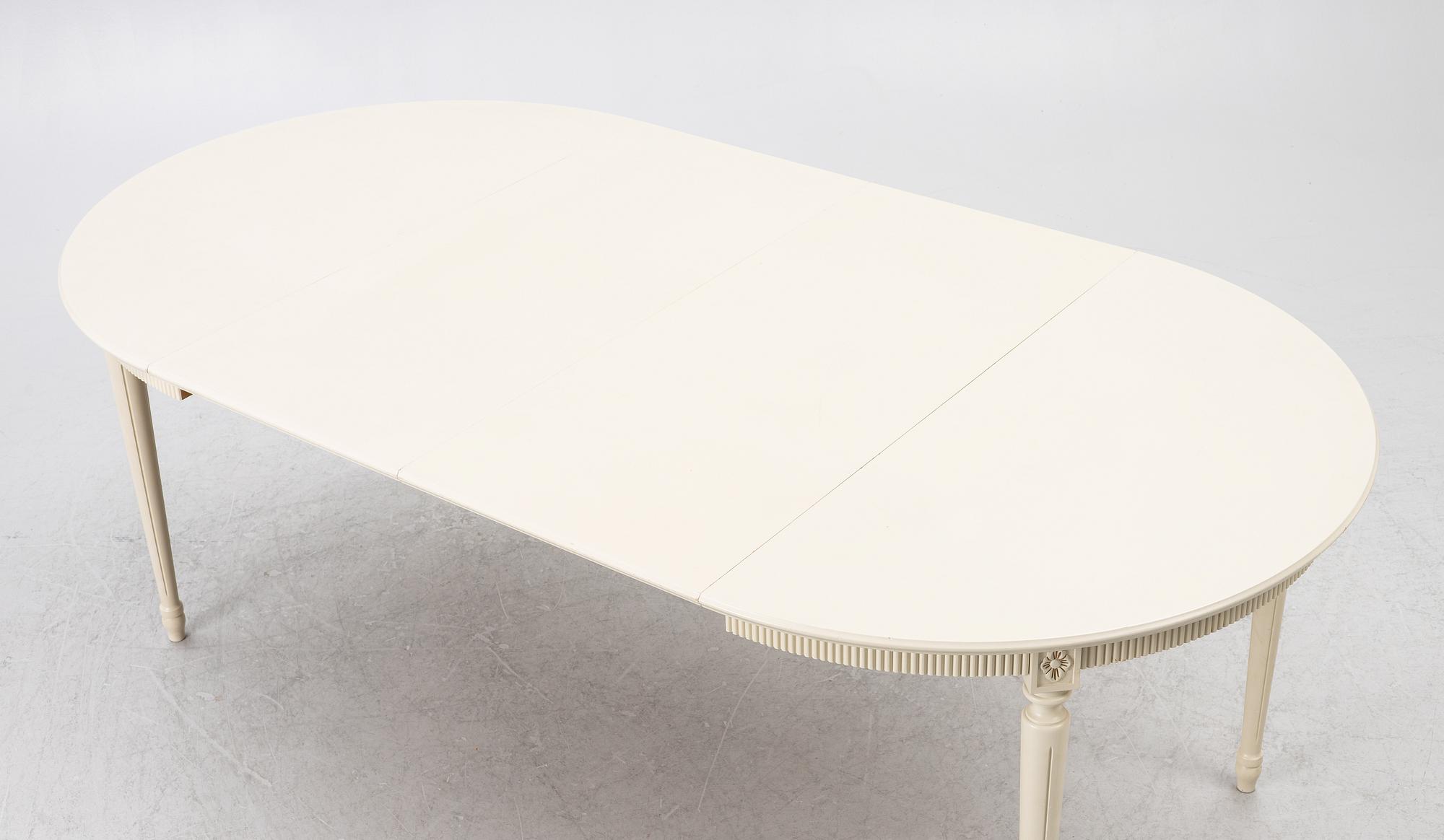 Dining table with 10 chairs, Gustavian style, second half of the 20th century.