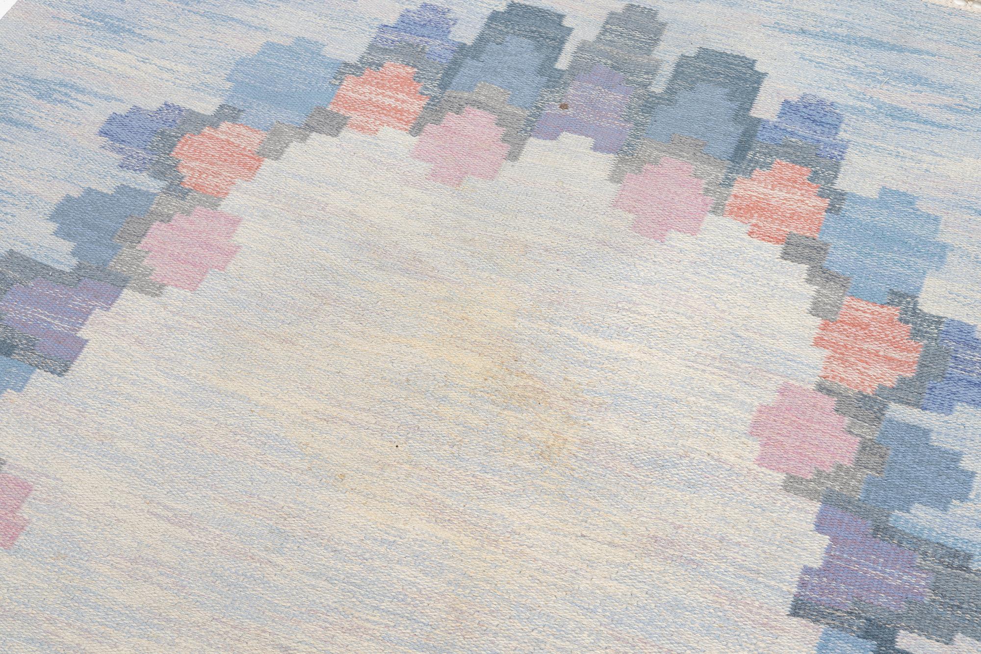 Judith Johansson, a carpet, 'Blomsterkrans', flat weave, c 273 x 208 cm, signed JJ.