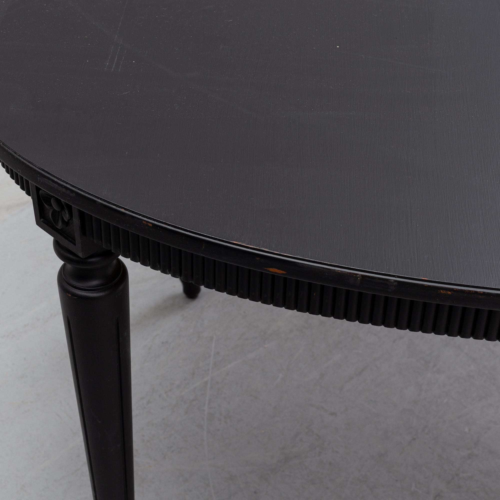 A painted Gustavian style dining table, second half of the 20th Century.