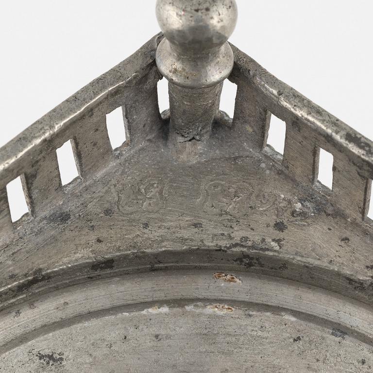 A matched pair of pewter candle sticks, 19th Century.