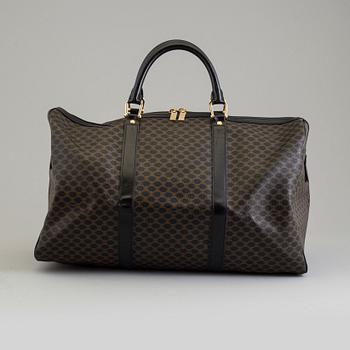 a CÉLINE weekend bag.