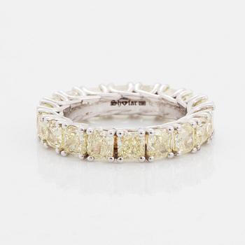 Cuschion-cut diamond eternity ring.