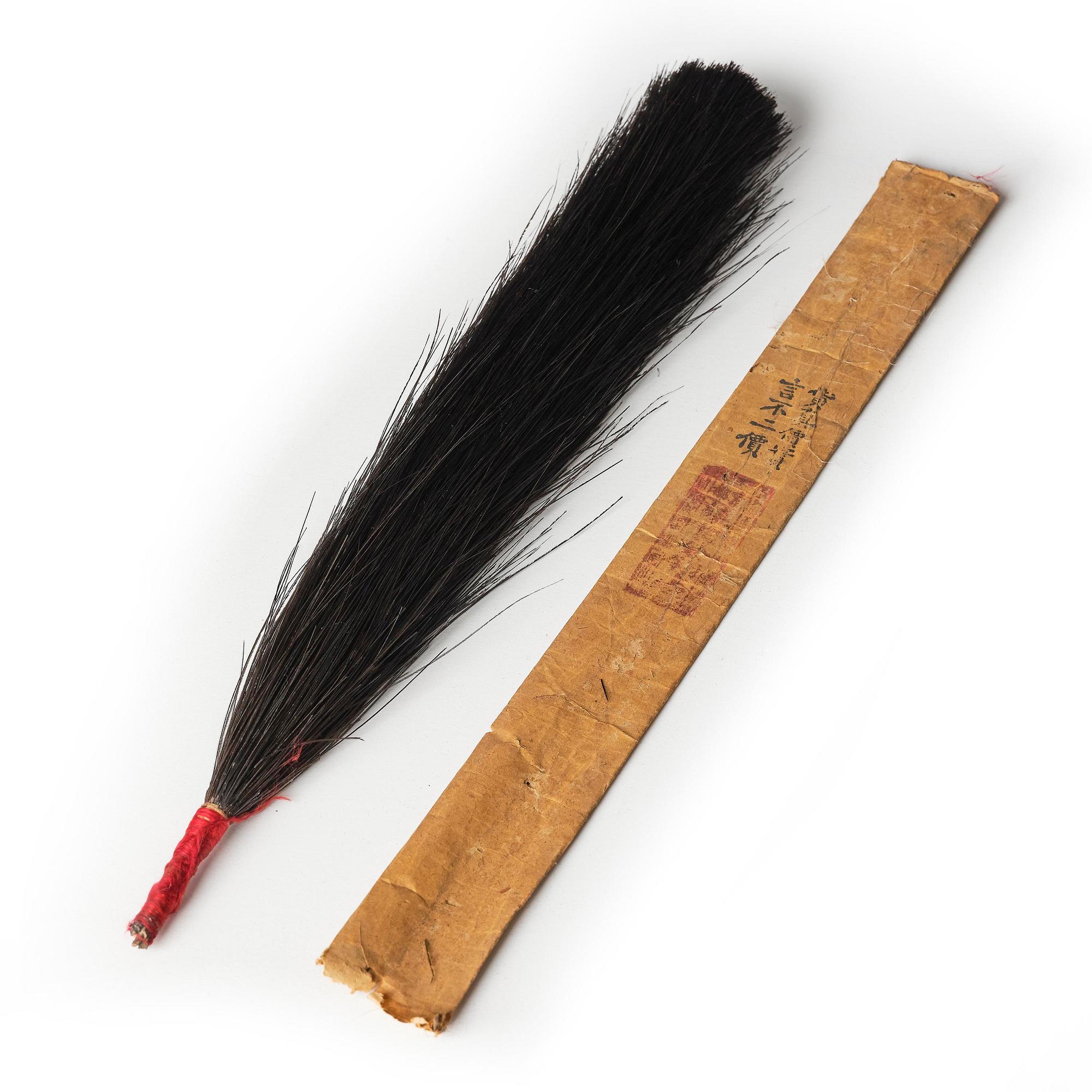 Two boxes with a mandarin's summer hat and black satin autumn hat and feather with six mandarin hat insignias.