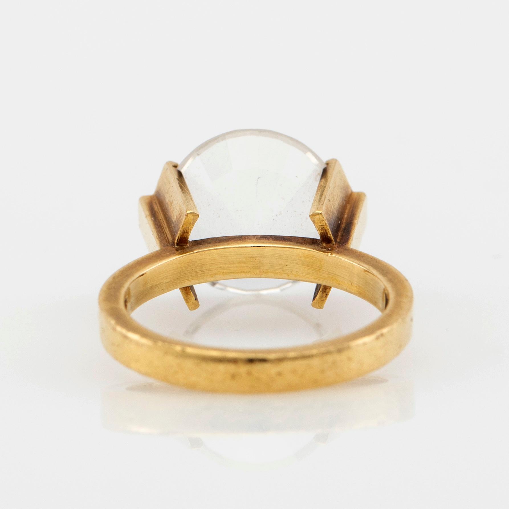 Wiwen Nilsson, Ring 18K gold with a round faceted rock crystal, Lund, 1968.