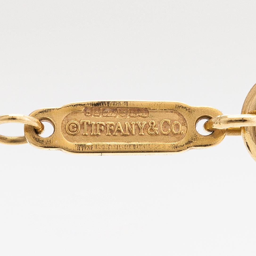 Tiffany & Co, An 18K gold necklace. Marked Tiffany & Co and T & Co.