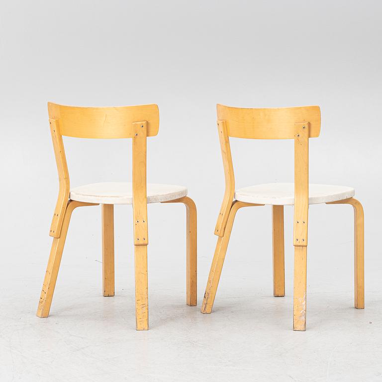 Alvar Aalto, a pair of model 69 chairs, Finland, second half of the 20th century.