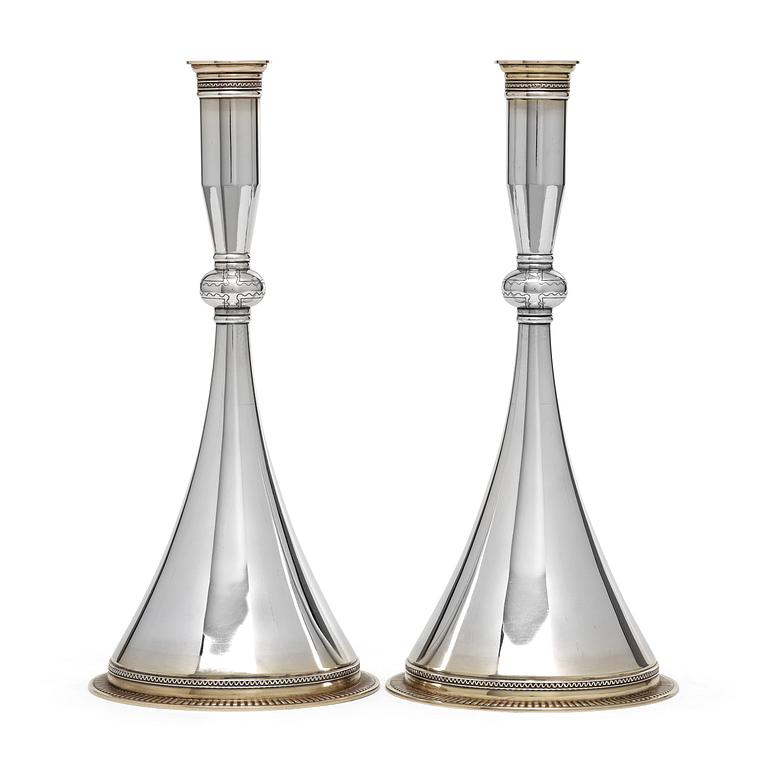 Wiwen Nilsson, A pair of Wiwen Nilsson sterling 'Byzantine' candlesticks, Lund 1956.