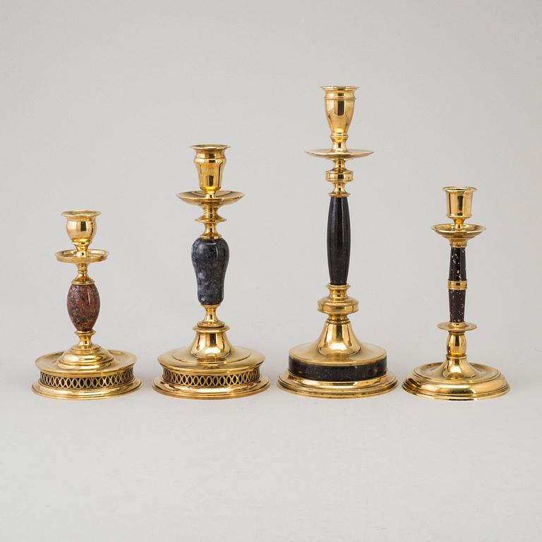 CARL HJALMAR NORRSTRÖM, after. Four brass and stone candlesticks from Skultuna, numbered 161/300, 1997.