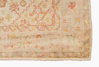 An antique Ushak carpet, c. 335 x 259 cm.