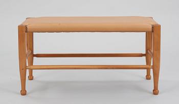 A Josef Frank mahogany and brown leather bench, Svenskt Tenn, model 2009.