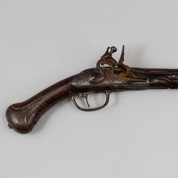 A Danish flint lock pistol signed, (Paul Nielsen Norrman, ca 1700).