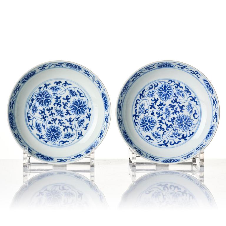 A set of four blue and white 'lotus dishes', Qing dynasty, Tongzhi mark and period (1862-1874).