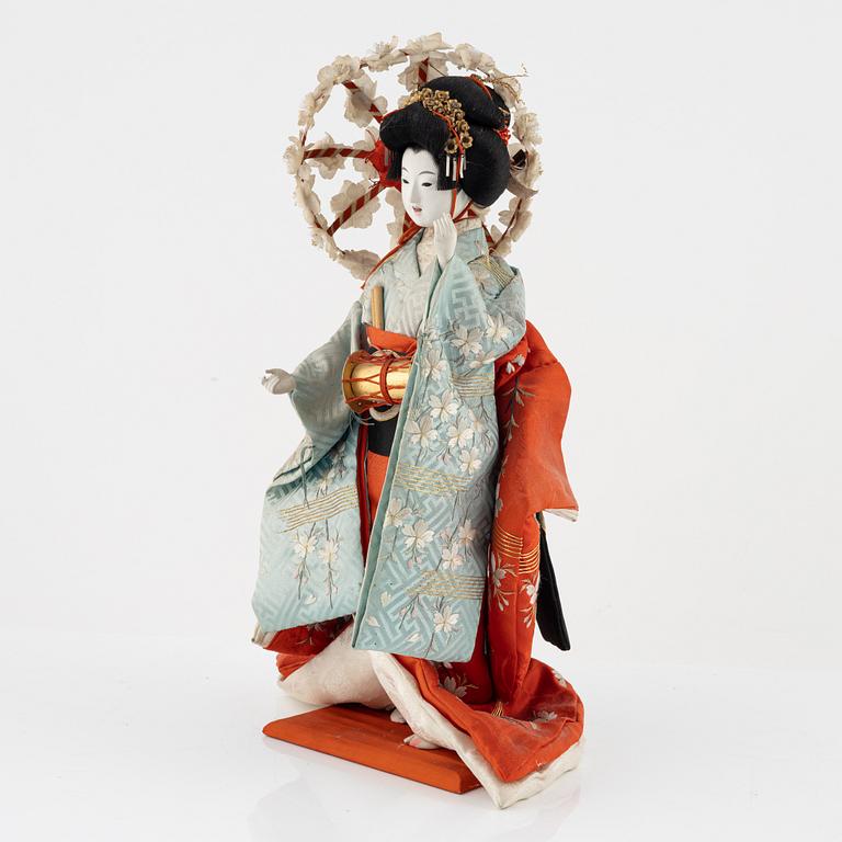 A Japanese doll, early 20th Century.