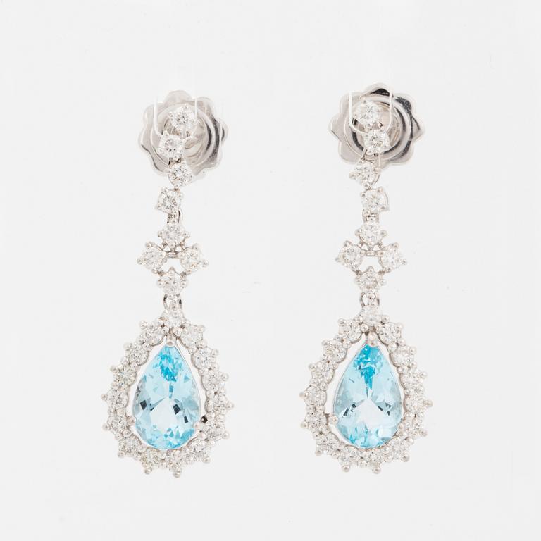 Topaz and brilliant-cut diamond earrings.