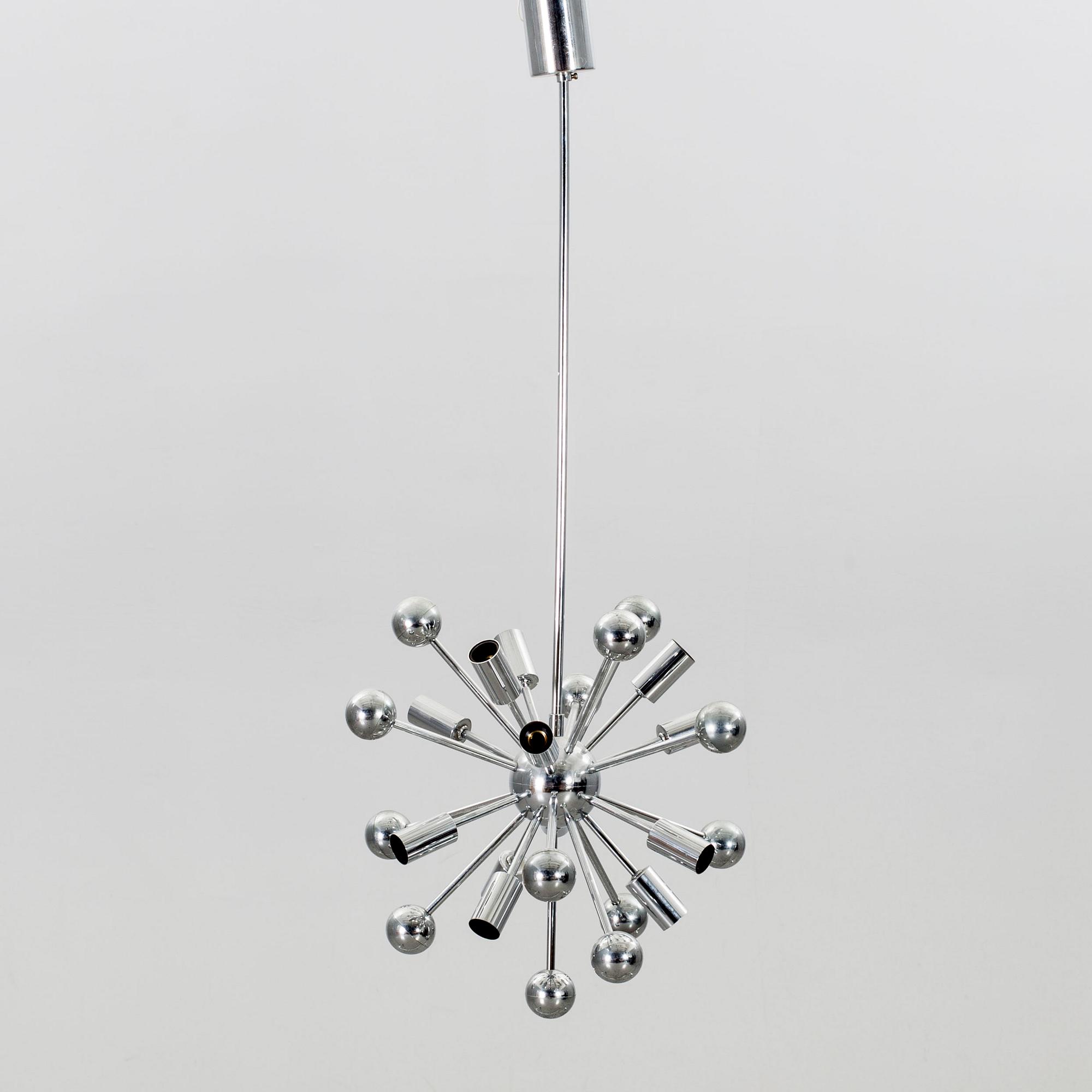 A Paul de Haan Sputnik pendant.