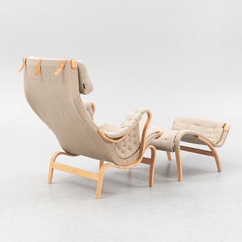 Bruno Mathsson, a 'Pernilla' armchair and a foot stool, Dux.