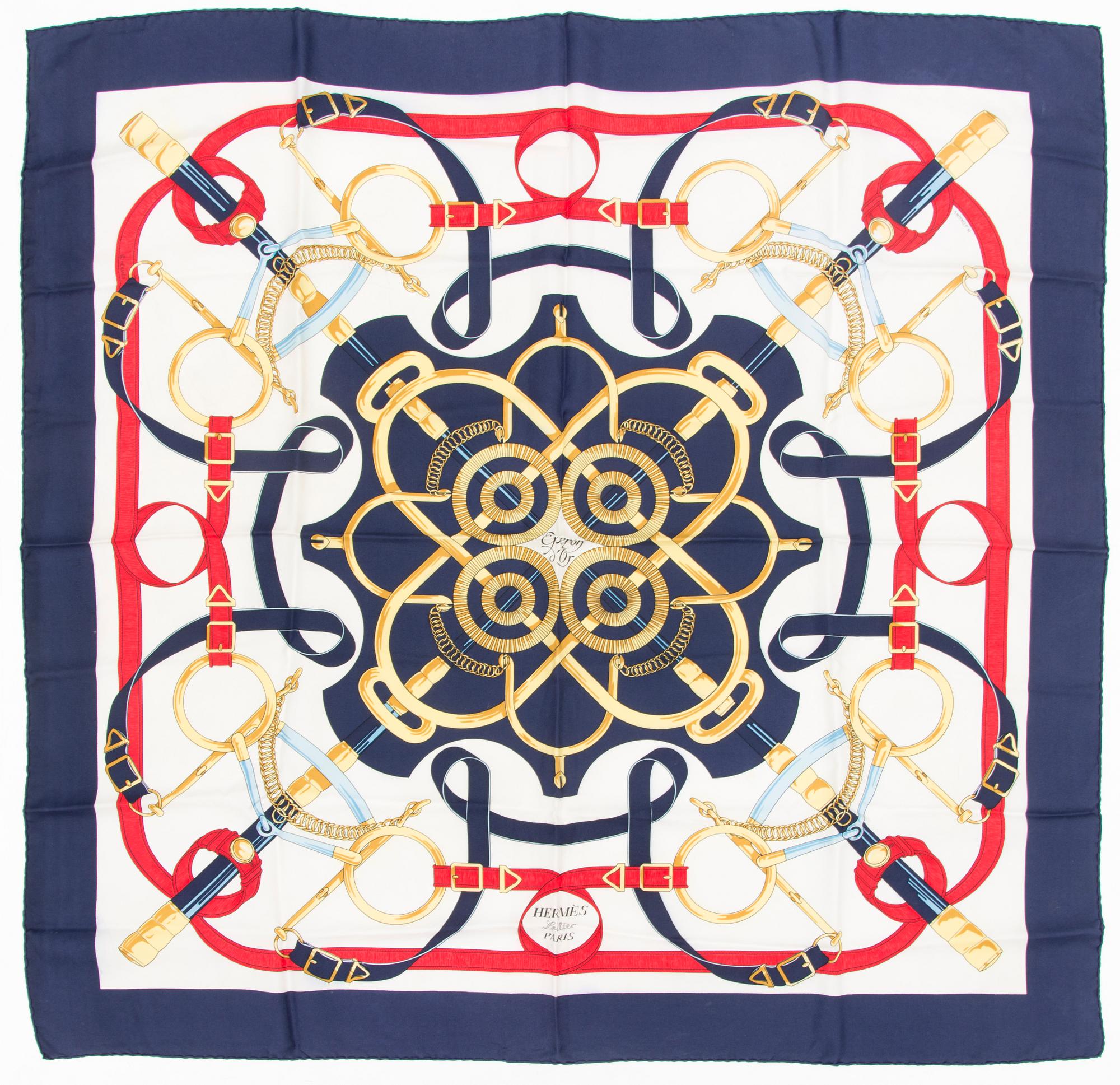 An 'Eperon d'Or' silk scarf.
