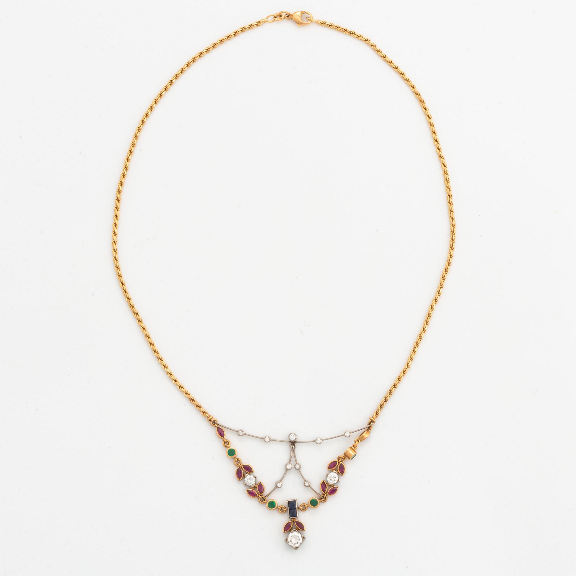 diamond, rubies, and emerald and sapphire necklace.