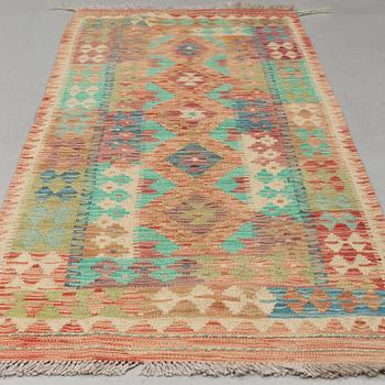 A RUG, kilim 192 x 77 cm.