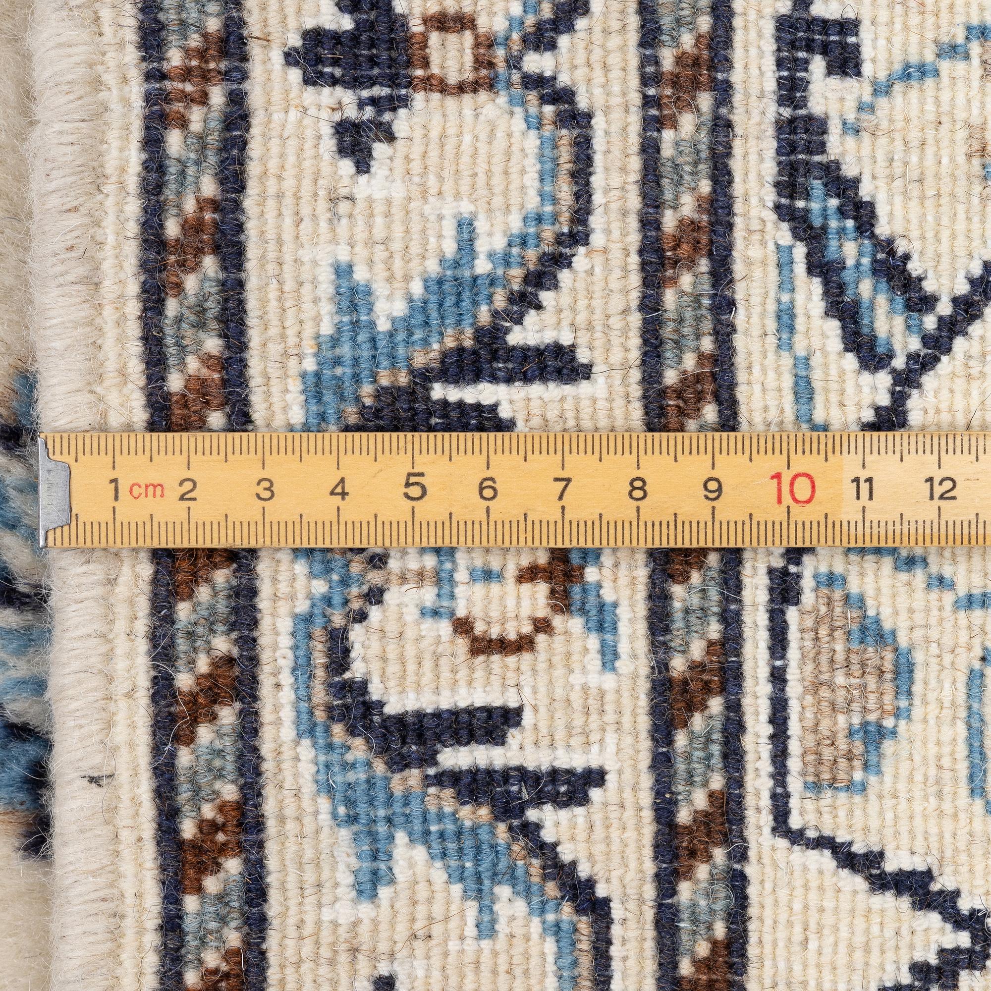 A Nain carpet, c. 275 x 195 cm.