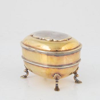 A parcel-gilt silver sugar box, Carrington & Co, London, England, 1894.