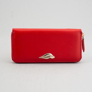 Diane von Fürstenberg a red leather handbag and wallet.