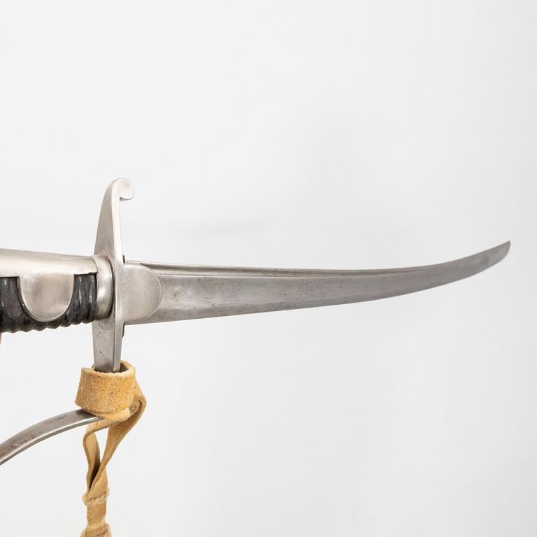 A Swedish artillery sword , 1831 pattern. with scabbard.