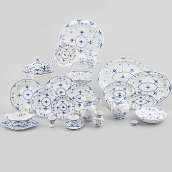 Royal Copenhagen, a 116-piece 'blue Fluted' porcelain dinner and coffee service, half lace, Denmark, mostly 1923-34.