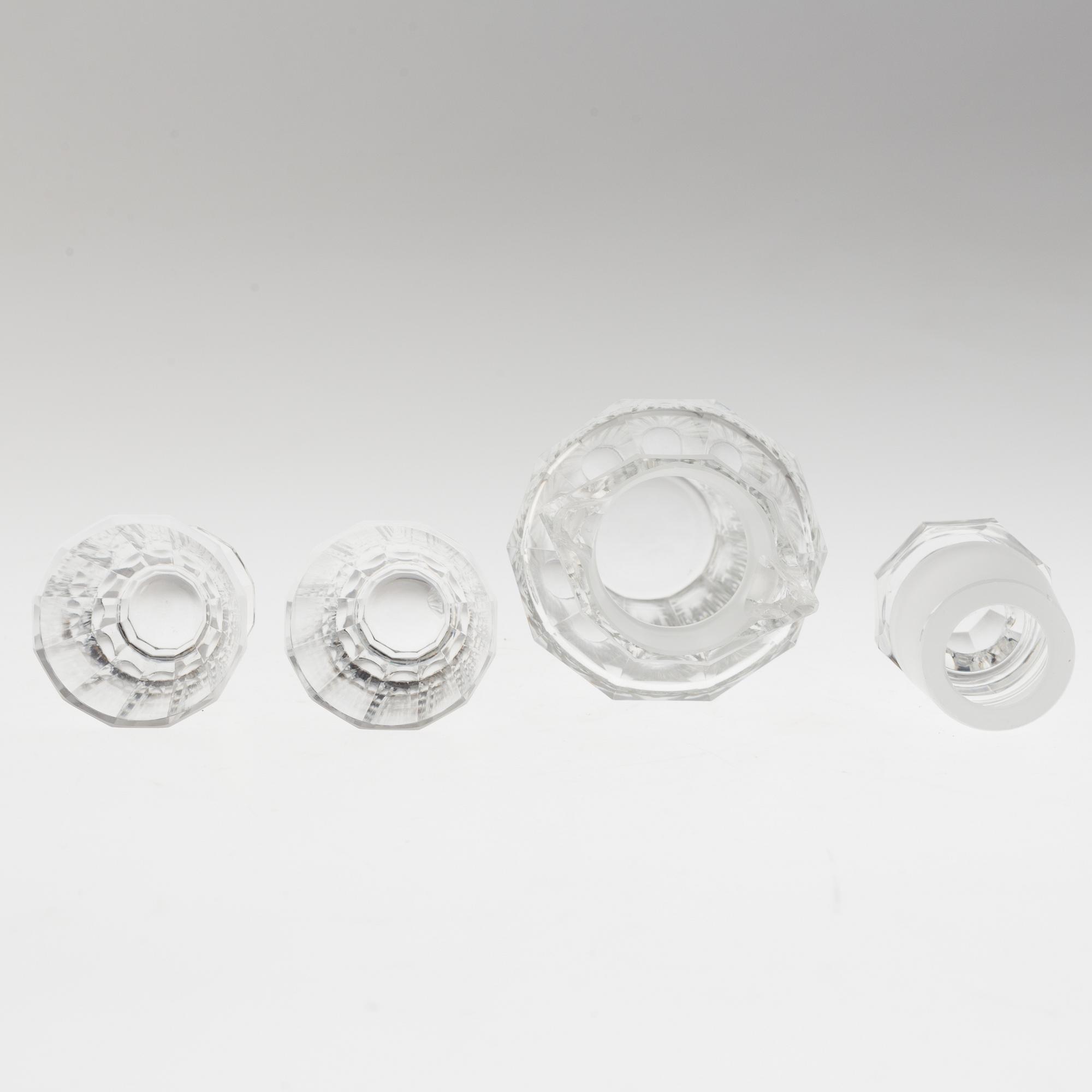 A set of twelve glasses and a cocktailshaker by Elis Berg, Kosta.