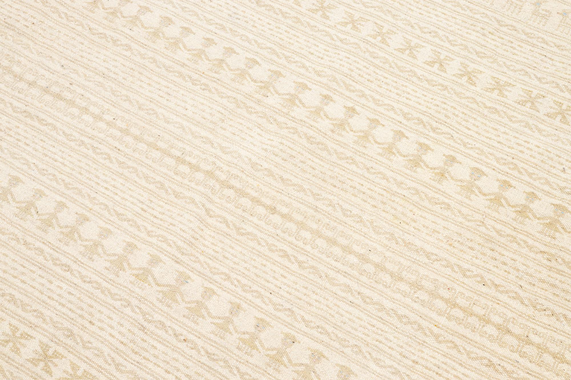A Kilim part-silk carpet, c. 257 x 241 cm.