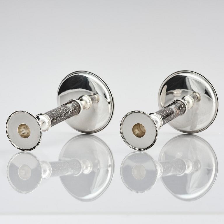 Henrik Ingemansson, a pair of sterling silver and Älvdal porphyry candelsticks, Ingemansson's Smithy, Stockholm, 2002.