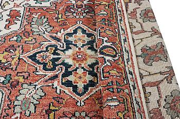 An oriental carpet with Mamluk design, c. 367 x 280 cm.