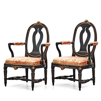 63. A pair of Gustavian late 18th century armchairs.