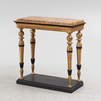 A late Gustavian giltwood, patinated and marble console attributed to J. Frisk (master in Stockholm 1805-24).