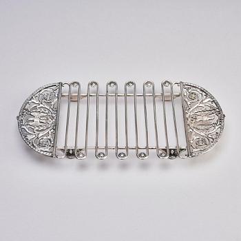 A silver asparagus cradle by W.A. Bolin, Moscow 1912-17.