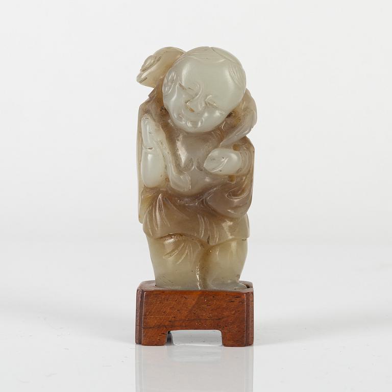 A Chinese stone figure, 20th century.