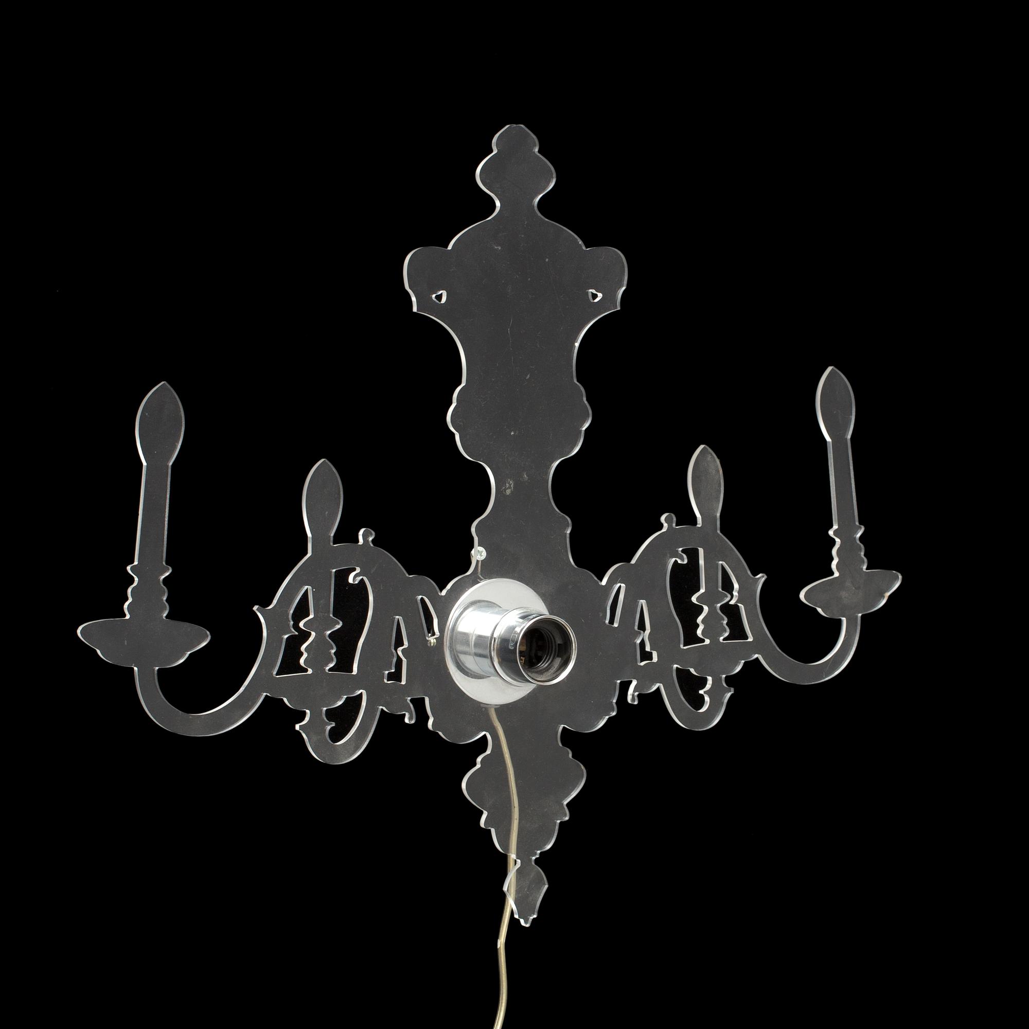 A Ligne Roset 'Louis 5D' wall light by Blandine Dubos.