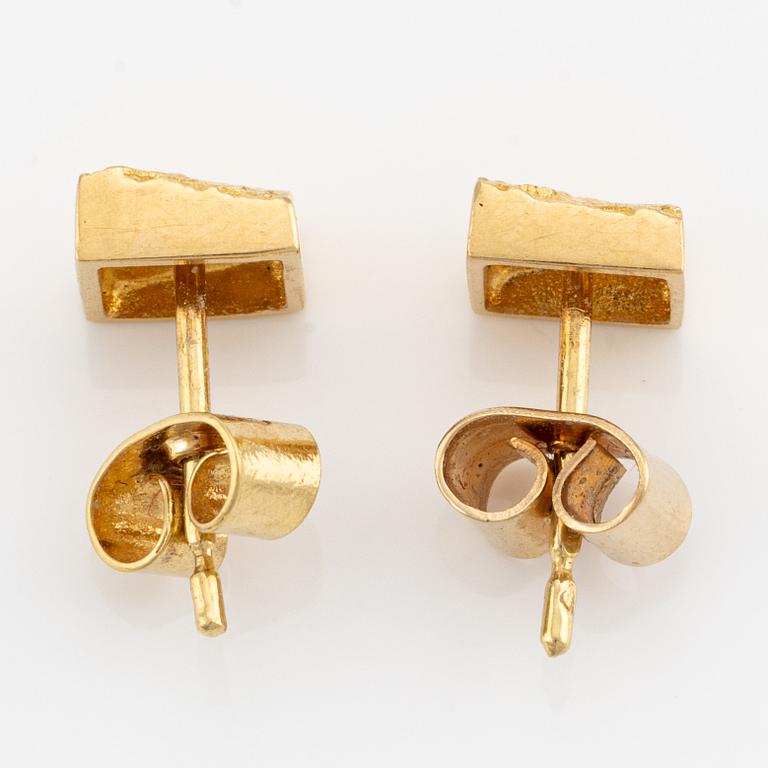 Lapponia, a bracelet and a pair of earrings, 18K gold.